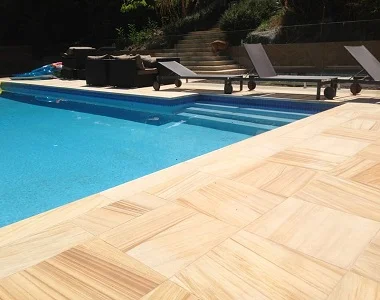 Teakwood sandstone pool coping tiles drop face by stone pavers melbourne, sydney, canberra, brisbane, adelaide, and hobart..