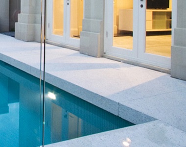 white granite pool coping drop face