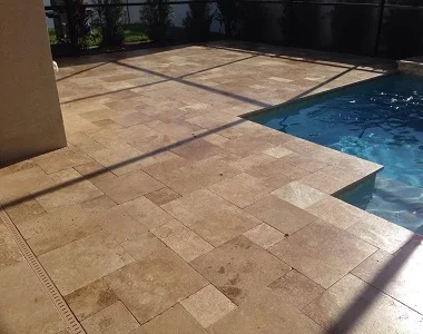 Noce Travertine Drop Face Pool Coping Tiles, dark tiles, brown tiles, ochre tiles, stone pavers australia