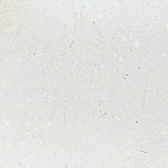 close up image of white limestone pavers